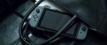 Nintendo Switch-Konsole mit roter und blauer Neon V3 Wireless Joy-Con – Bild 7