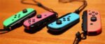 Nintendo Switch-Konsole mit Paar kabelloser Joy-Con-Controller Rot und Neonblau V3 – Bild 7