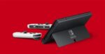 Nintendo Switch (OLED-Modell) mit Dock und weißen Joy-Con-Controllern – Bild 7